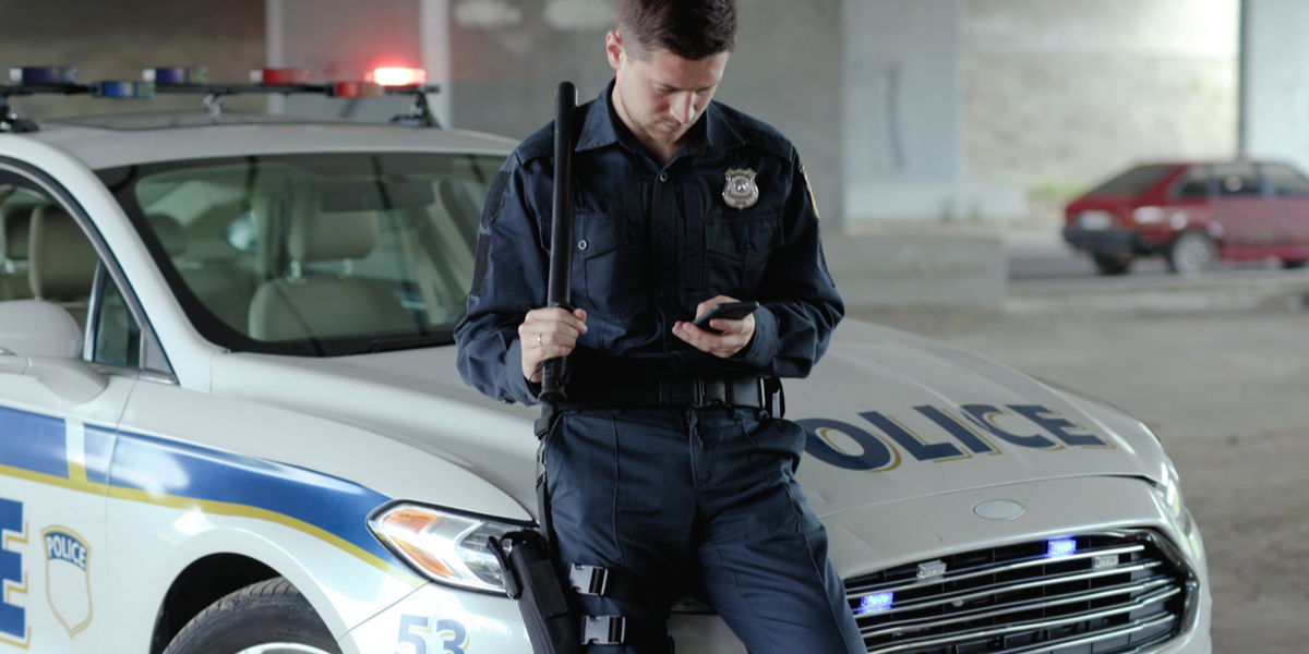 Officer with Digital Evidence on his Mobile Device